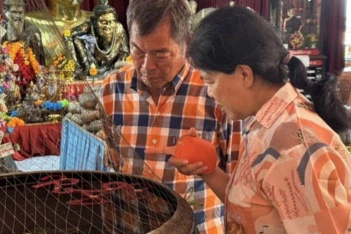 Woman won the lottery after visiting a shrine in Thailand