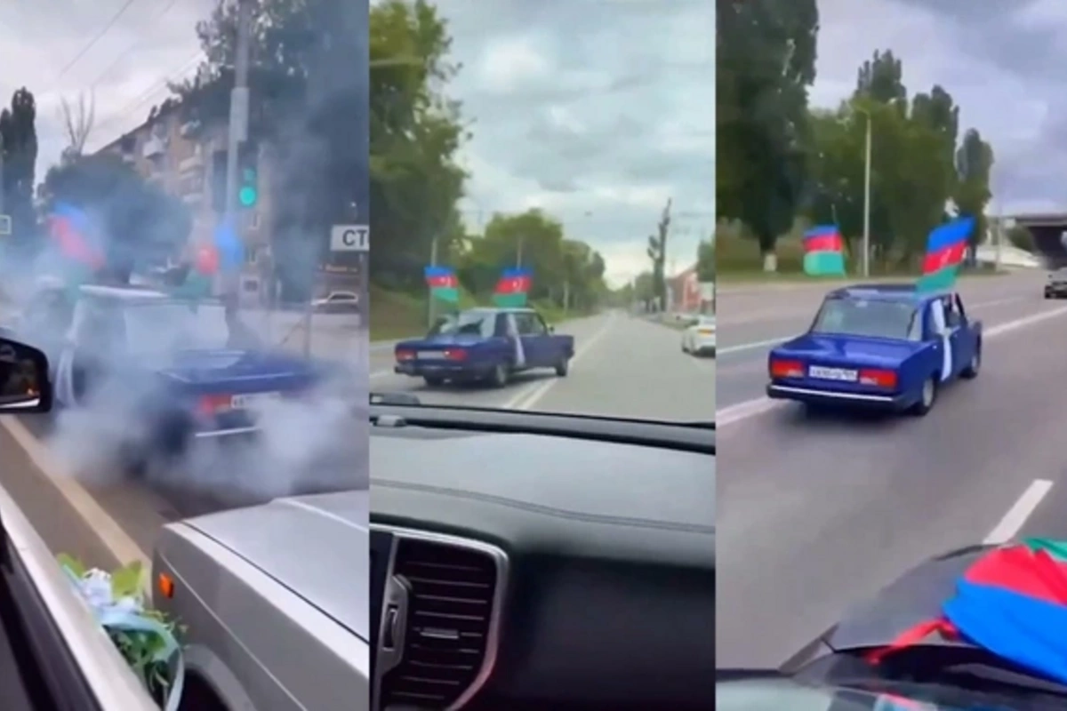 In Russia, police began an investigation after a motorcade with Azerbaijani flags