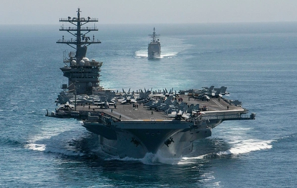 American aircraft carrier heading to the Middle East turned off its transponder