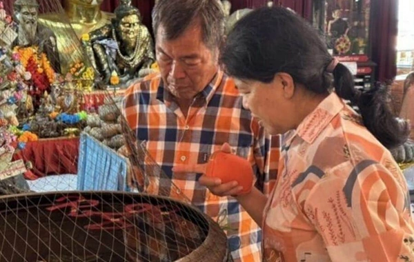 Woman won the lottery after visiting a shrine in Thailand
